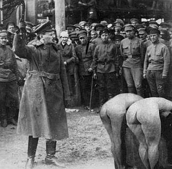  Trotskyite group A picture of Leon Trotsky standing over the naked 